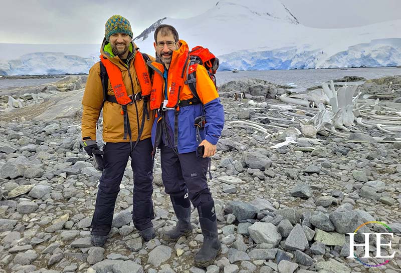 Zach Moses and Richard levy stand with each other on Antarctica, March 2023