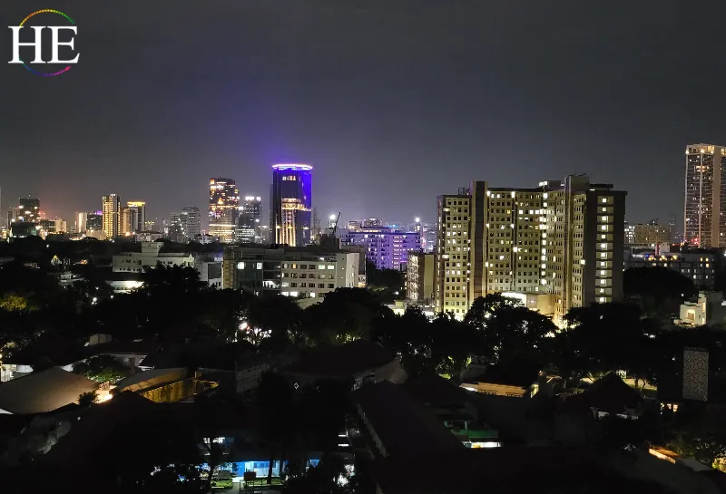 Night skyline of Jakarta, Indonesia lit up with bright lights. 