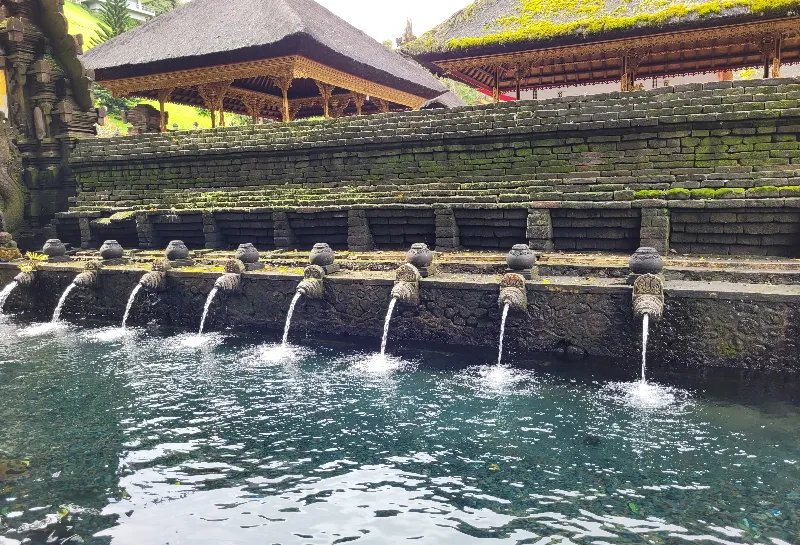 Sacred pools of Titra Empul. Water pours from sacred nozzels.